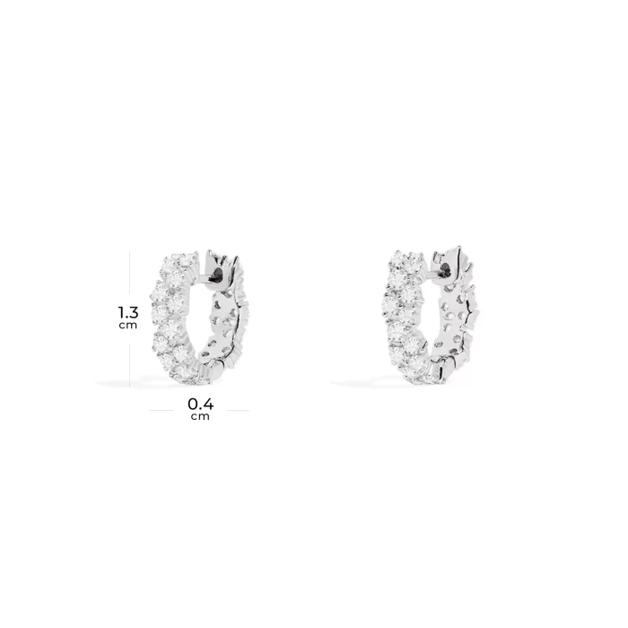 APM Monaco Boucles d’oreilles Huggie pavées Argent Sterling